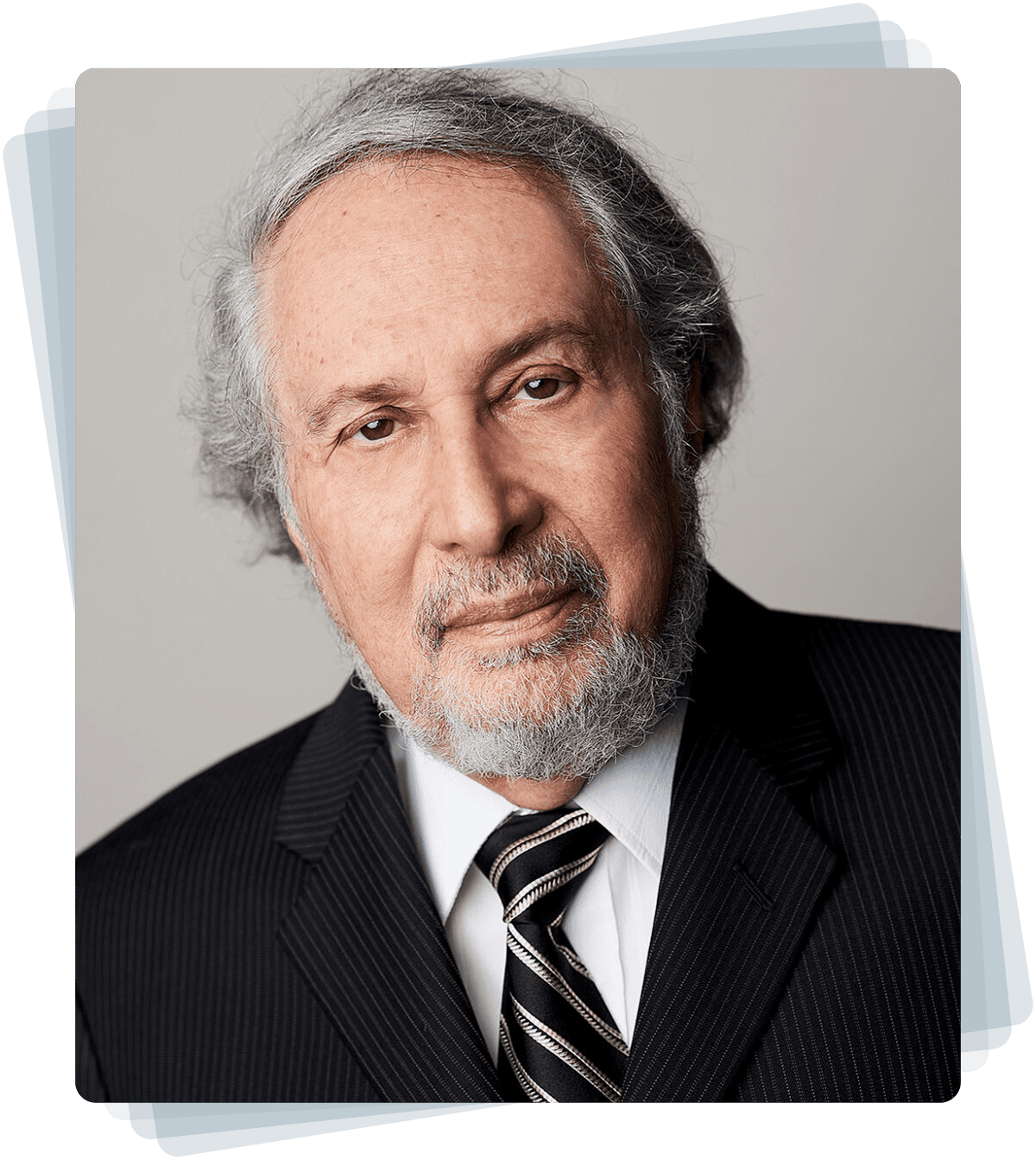 Elderly man in a suit and tie.